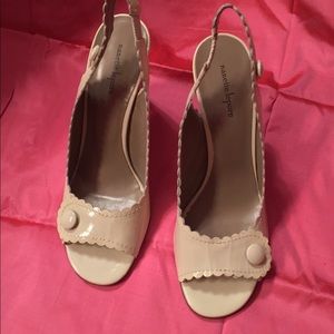 Cream patent leather slingbacks